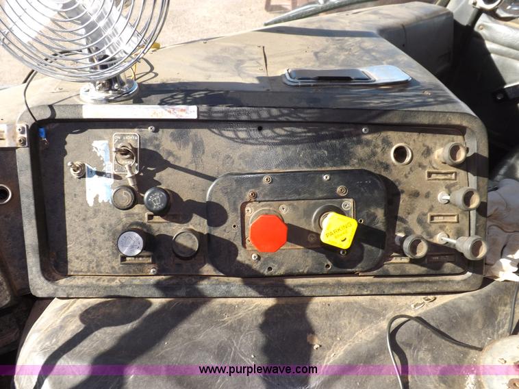 image for item I9217 1992 Volvo WX64 trash truck