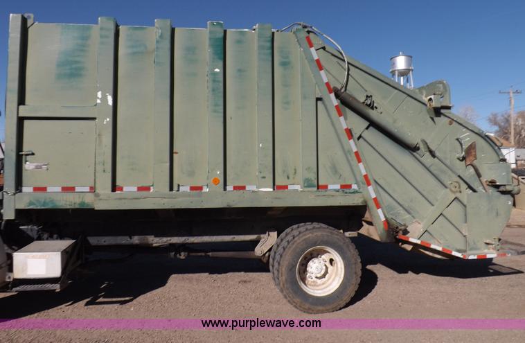 image for item I9217 1992 Volvo WX64 trash truck