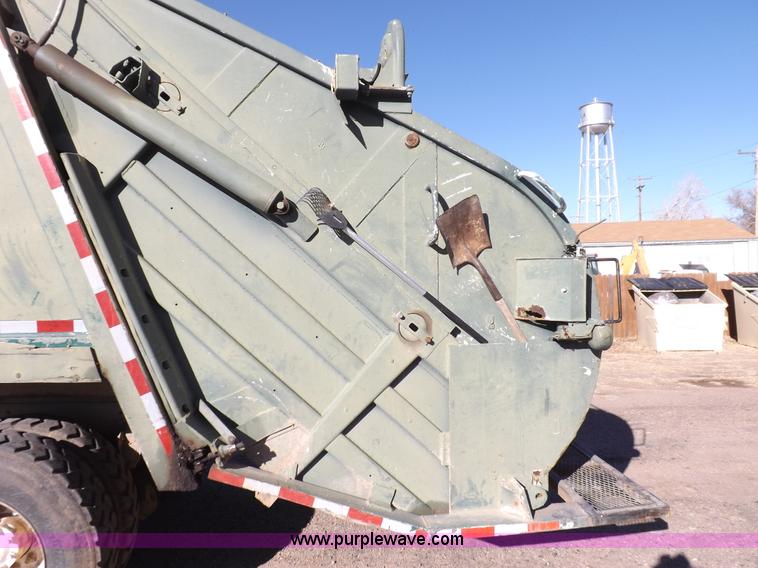 image for item I9217 1992 Volvo WX64 trash truck