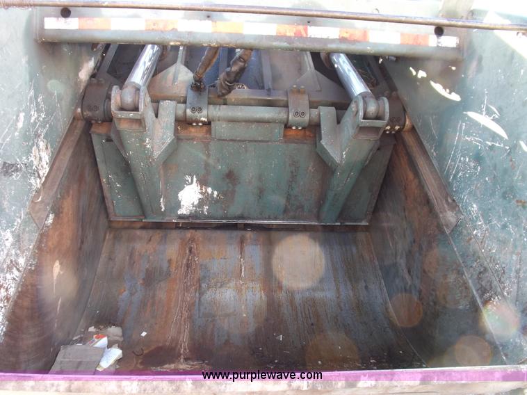 image for item I9217 1992 Volvo WX64 trash truck