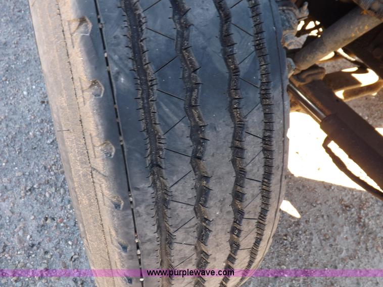 image for item I9217 1992 Volvo WX64 trash truck