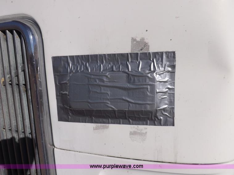 image for item I9217 1992 Volvo WX64 trash truck