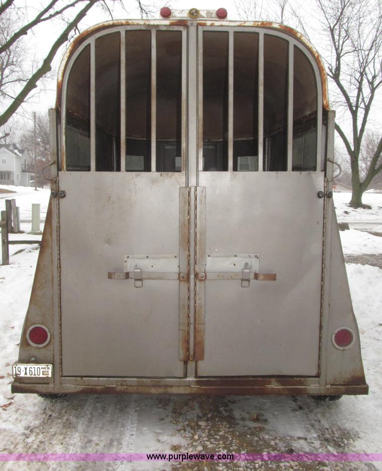 image for item F7223 1977 Flying L two horse tandem axle stock trailer