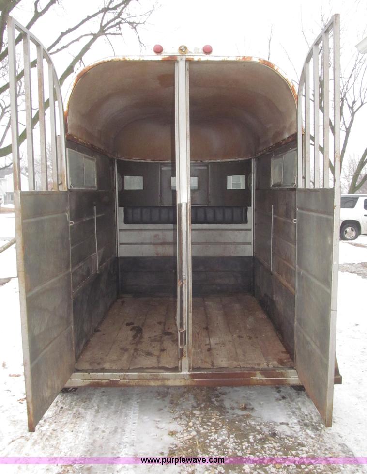 image for item F7223 1977 Flying L two horse tandem axle stock trailer