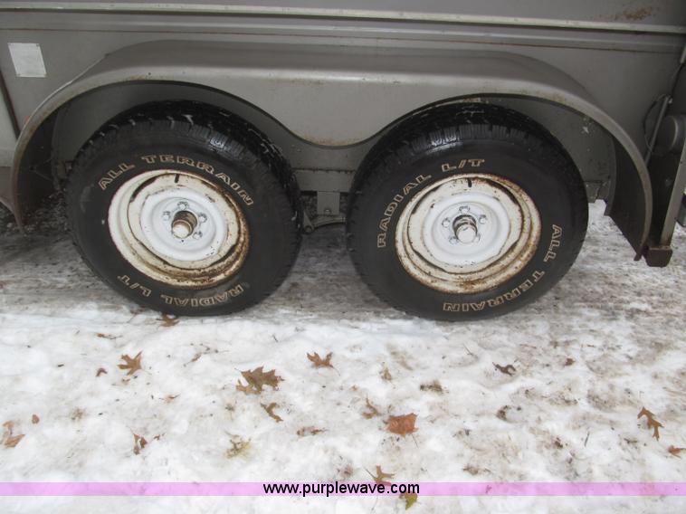 image for item F7223 1977 Flying L two horse tandem axle stock trailer