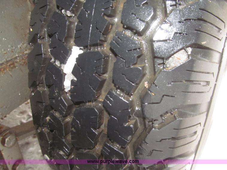 image for item F7223 1977 Flying L two horse tandem axle stock trailer