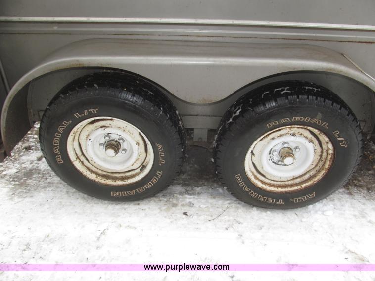 image for item F7223 1977 Flying L two horse tandem axle stock trailer