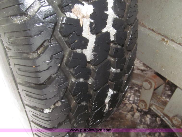 image for item F7223 1977 Flying L two horse tandem axle stock trailer