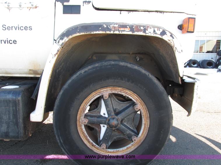 image for item I4943 1986 Chevrolet Kodiak flatbed truck