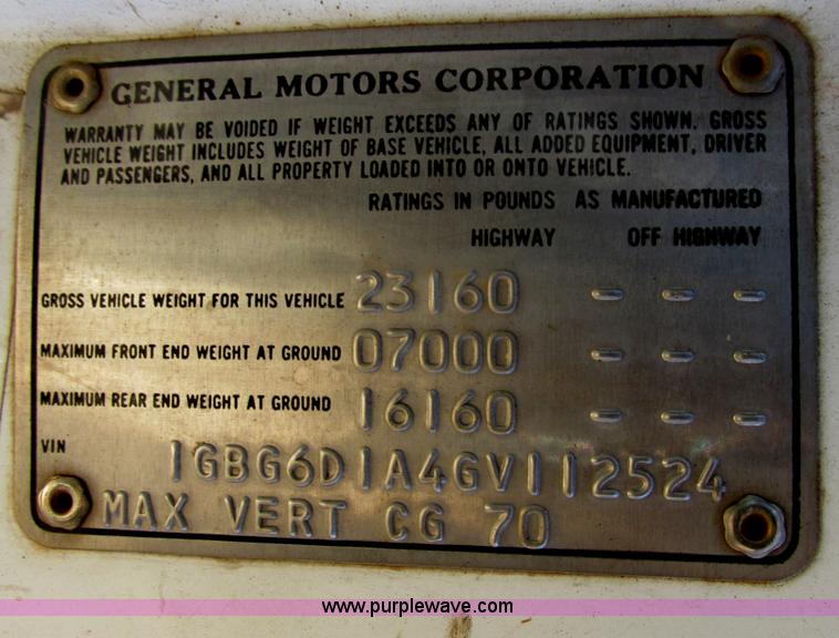 image for item I4943 1986 Chevrolet Kodiak flatbed truck