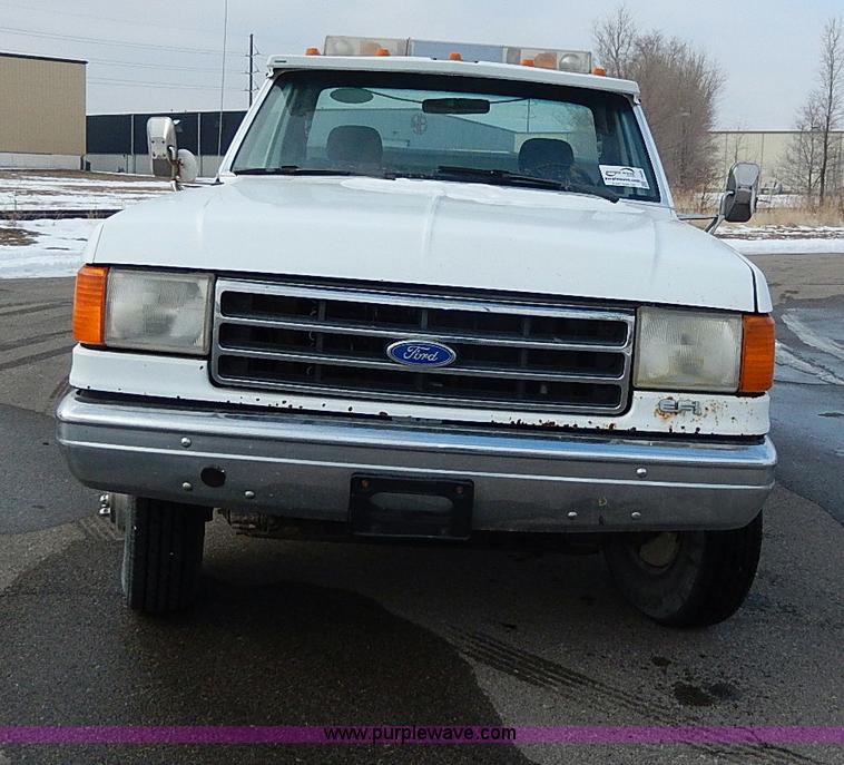 image for item I9465 1988 Ford F450 Super Duty custom rollback truck
