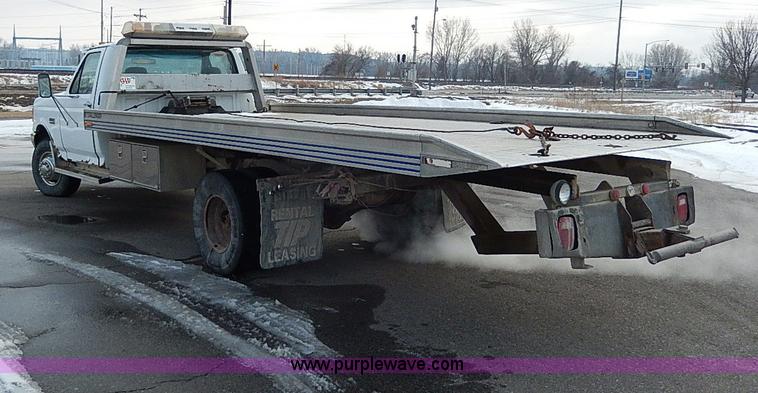 image for item I9465 1988 Ford F450 Super Duty custom rollback truck