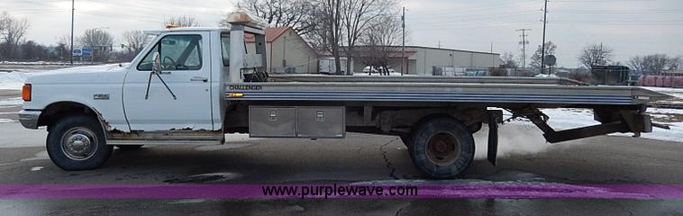 image for item I9465 1988 Ford F450 Super Duty custom rollback truck