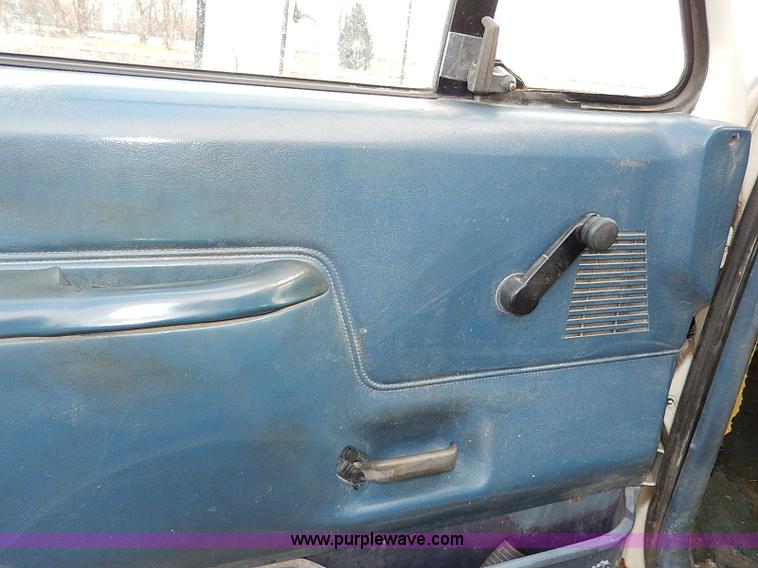 image for item I9465 1988 Ford F450 Super Duty custom rollback truck