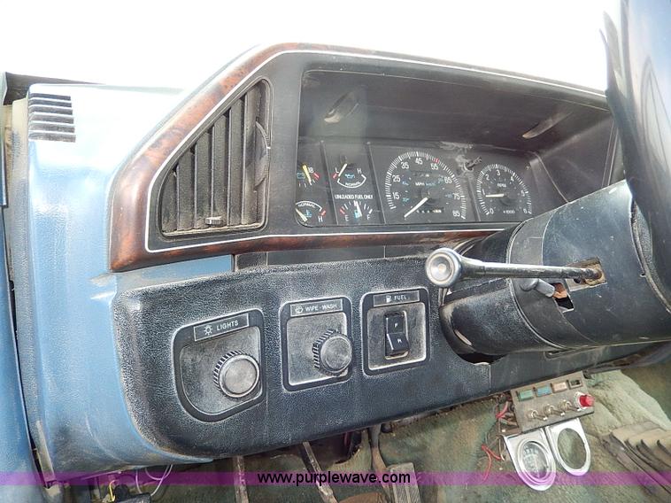 image for item I9465 1988 Ford F450 Super Duty custom rollback truck