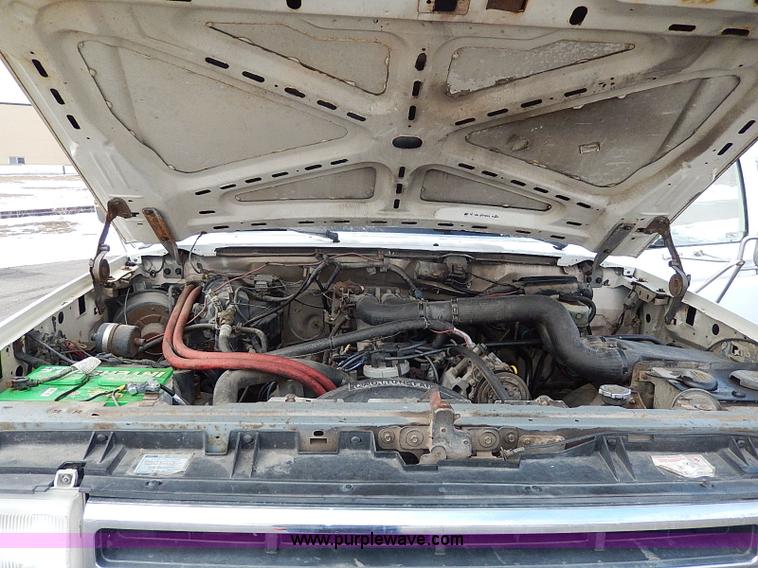 image for item I9465 1988 Ford F450 Super Duty custom rollback truck