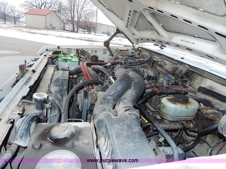 image for item I9465 1988 Ford F450 Super Duty custom rollback truck