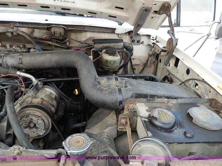 image for item I9465 1988 Ford F450 Super Duty custom rollback truck