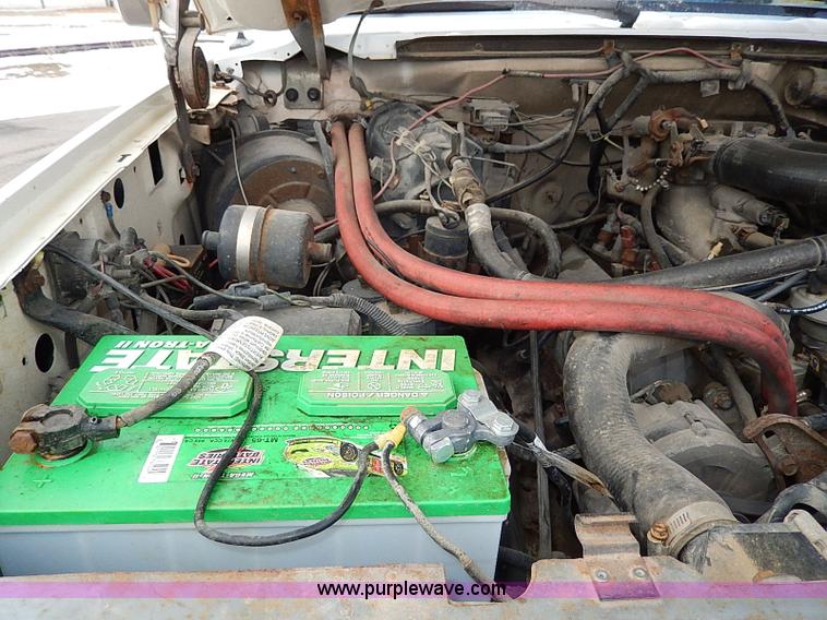 image for item I9465 1988 Ford F450 Super Duty custom rollback truck