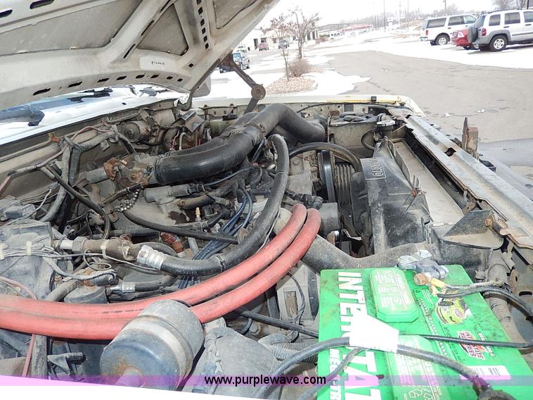 image for item I9465 1988 Ford F450 Super Duty custom rollback truck