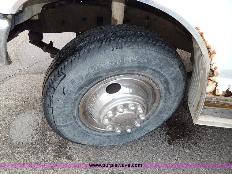 image for item I9465 1988 Ford F450 Super Duty custom rollback truck