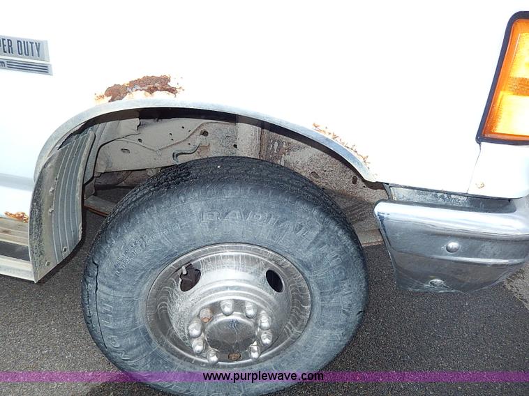 image for item I9465 1988 Ford F450 Super Duty custom rollback truck