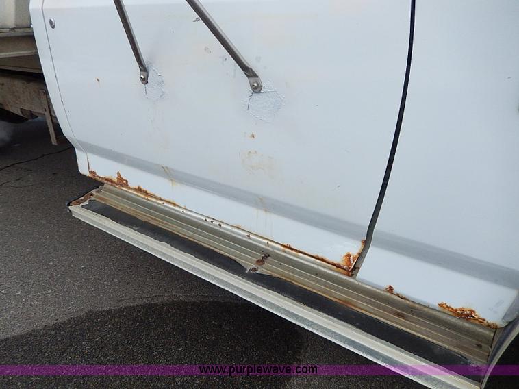 image for item I9465 1988 Ford F450 Super Duty custom rollback truck