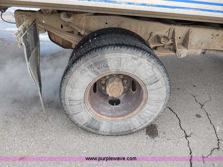 image for item I9465 1988 Ford F450 Super Duty custom rollback truck