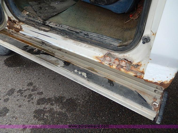 image for item I9465 1988 Ford F450 Super Duty custom rollback truck