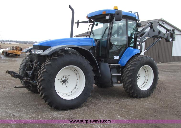 image for item E4647 2002 New Holland TV-140 bi-directional MFWD  tractor