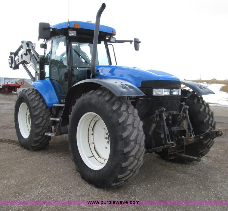 image for item E4647 2002 New Holland TV-140 bi-directional MFWD  tractor