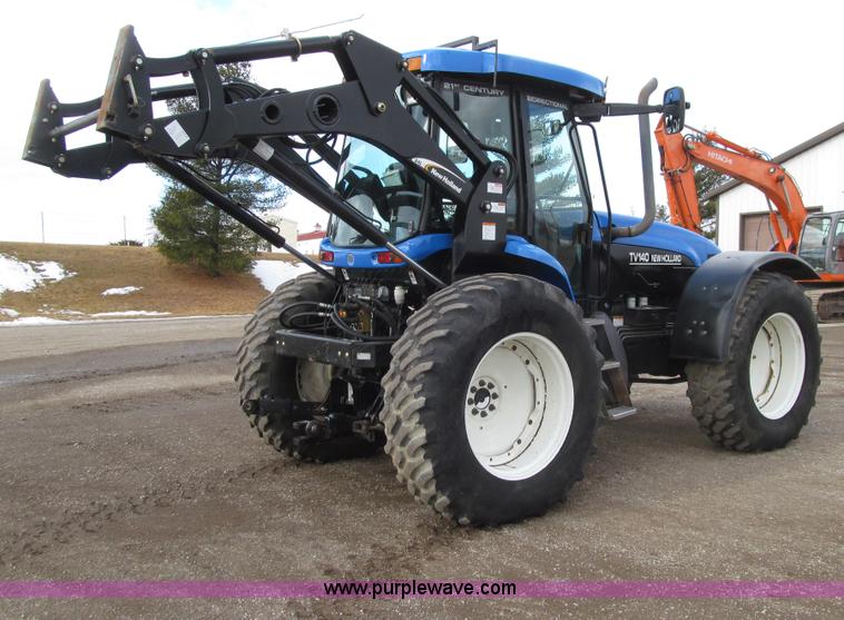 image for item E4647 2002 New Holland TV-140 bi-directional MFWD  tractor