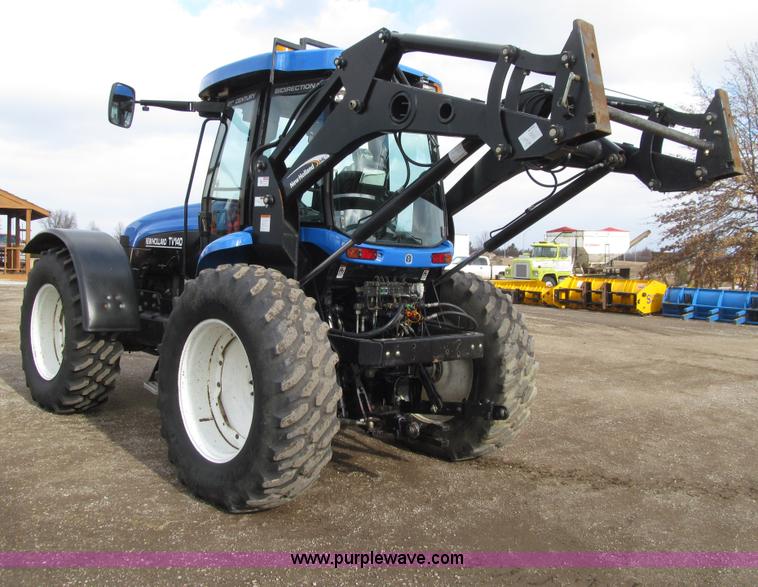 image for item E4647 2002 New Holland TV-140 bi-directional MFWD  tractor