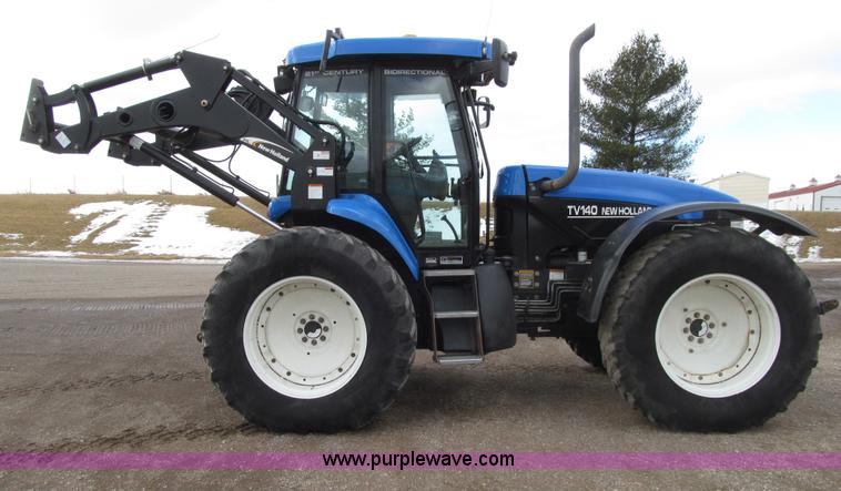 image for item E4647 2002 New Holland TV-140 bi-directional MFWD  tractor