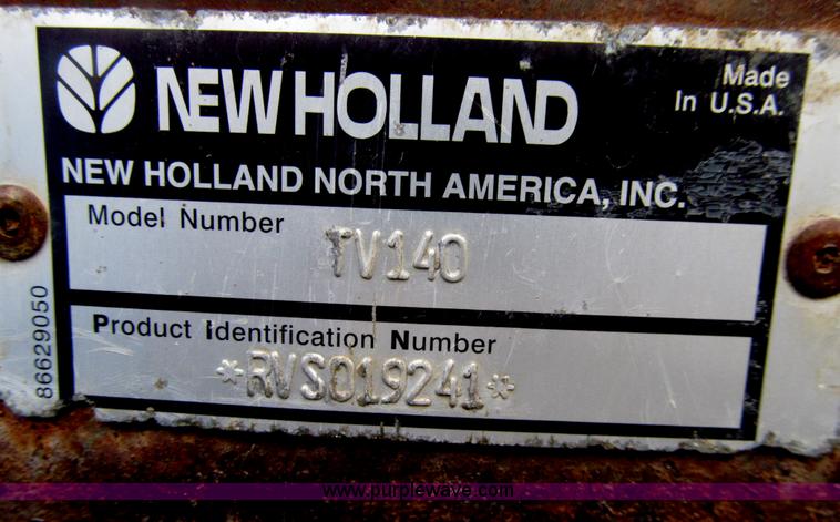 image for item E4647 2002 New Holland TV-140 bi-directional MFWD  tractor