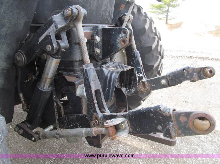 image for item E4647 2002 New Holland TV-140 bi-directional MFWD  tractor