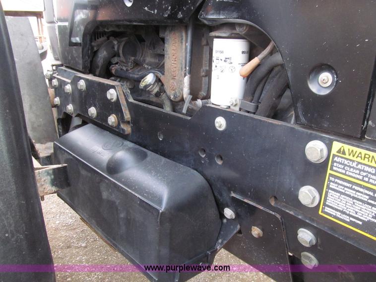 image for item E4647 2002 New Holland TV-140 bi-directional MFWD  tractor