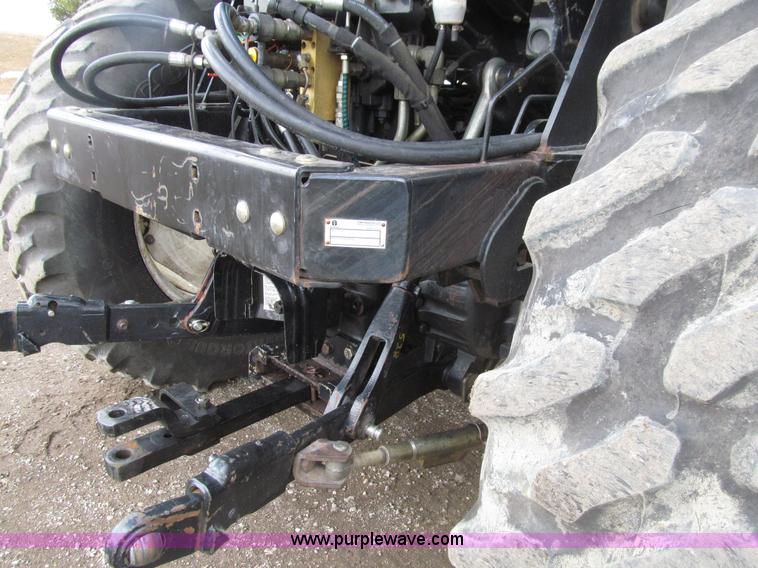 image for item E4647 2002 New Holland TV-140 bi-directional MFWD  tractor