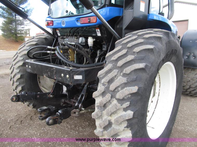image for item E4647 2002 New Holland TV-140 bi-directional MFWD  tractor