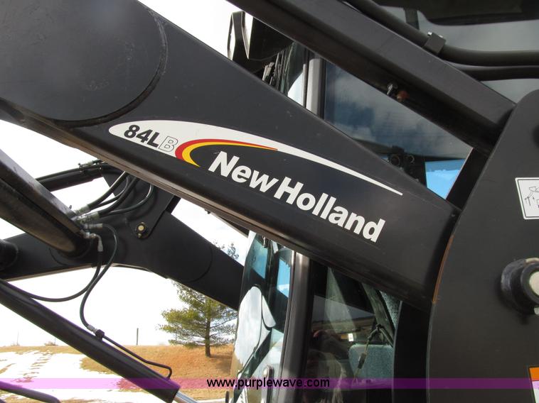 image for item E4647 2002 New Holland TV-140 bi-directional MFWD  tractor