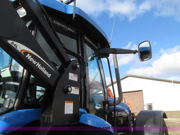 image for item E4647 2002 New Holland TV-140 bi-directional MFWD  tractor