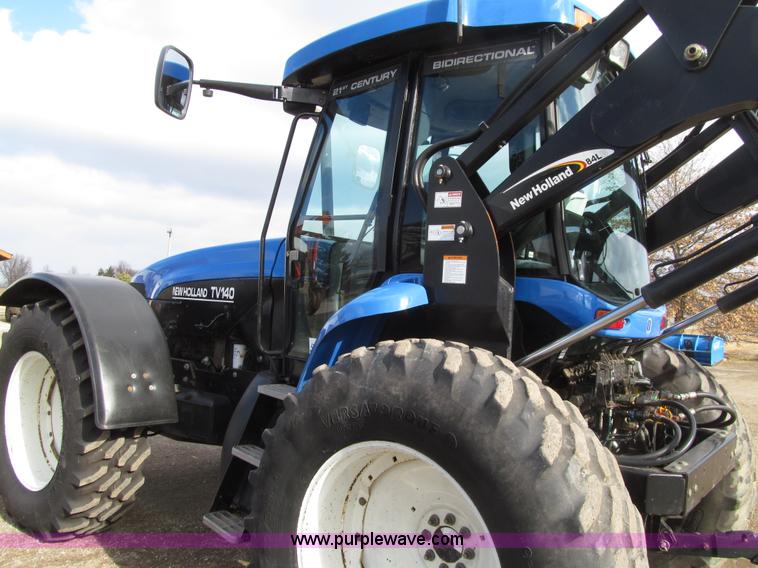 image for item E4647 2002 New Holland TV-140 bi-directional MFWD  tractor
