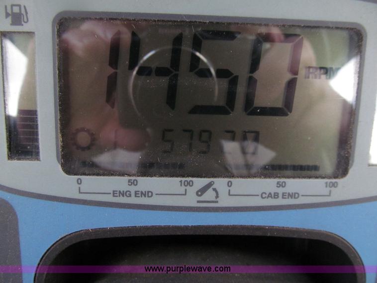 image for item E4647 2002 New Holland TV-140 bi-directional MFWD  tractor