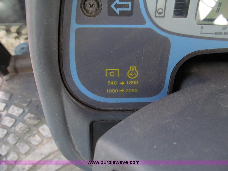 image for item E4647 2002 New Holland TV-140 bi-directional MFWD  tractor