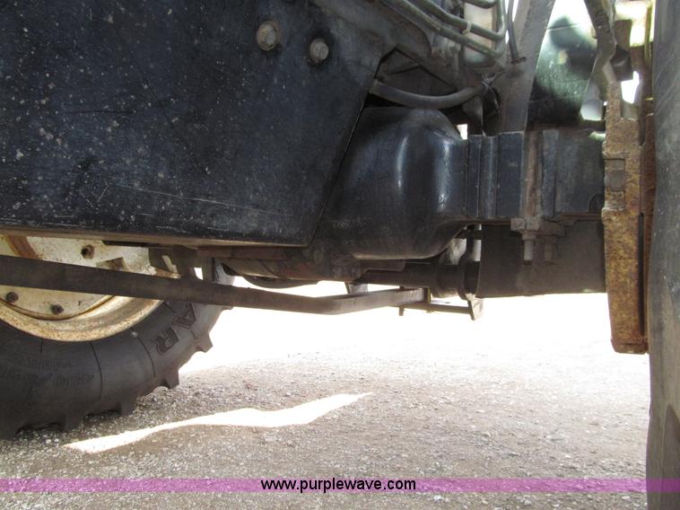 image for item E4647 2002 New Holland TV-140 bi-directional MFWD  tractor