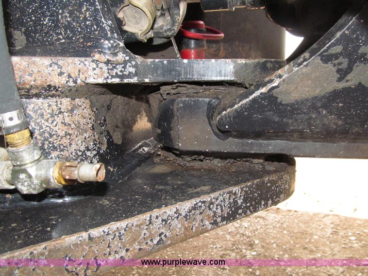 image for item E4647 2002 New Holland TV-140 bi-directional MFWD  tractor