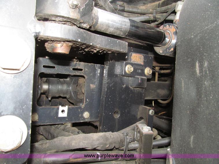 image for item E4647 2002 New Holland TV-140 bi-directional MFWD  tractor