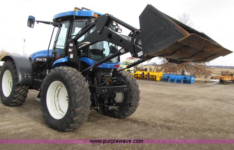 image for item E4647 2002 New Holland TV-140 bi-directional MFWD  tractor