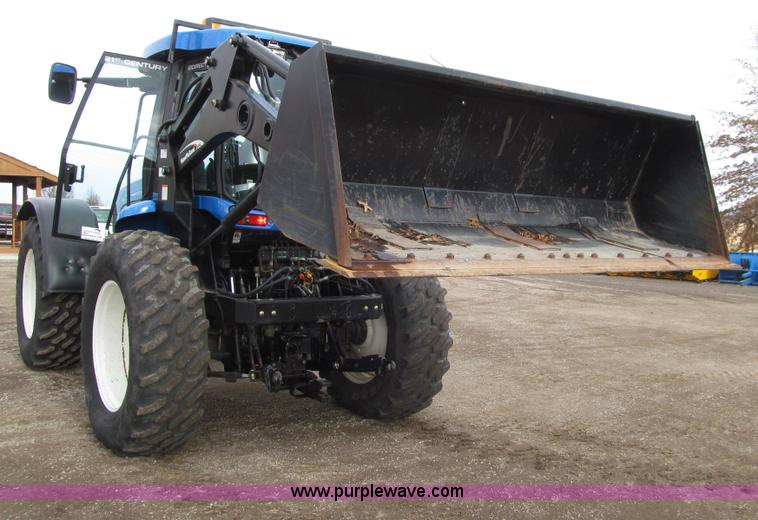 image for item E4647 2002 New Holland TV-140 bi-directional MFWD  tractor