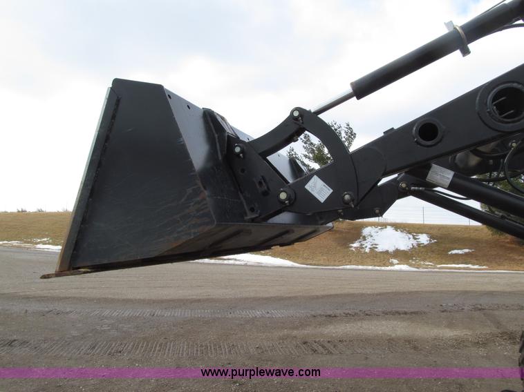 image for item E4647 2002 New Holland TV-140 bi-directional MFWD  tractor